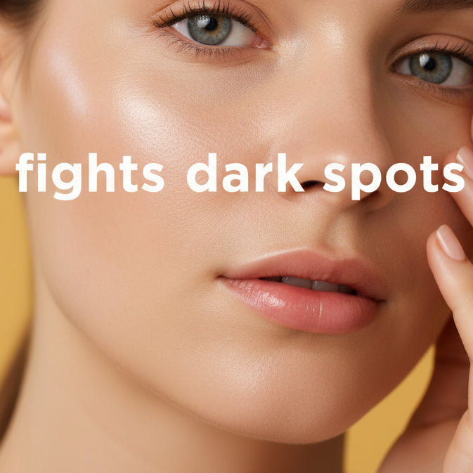 Close-up of a person's face with text 'fights dark spots' on a blurred background
